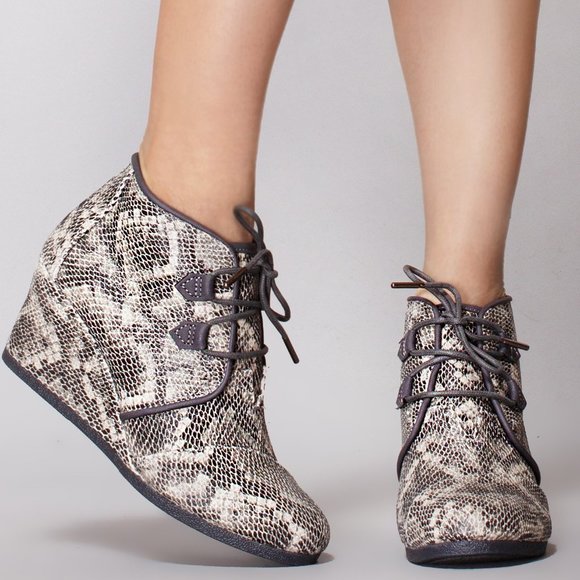 snakeskin wedge booties